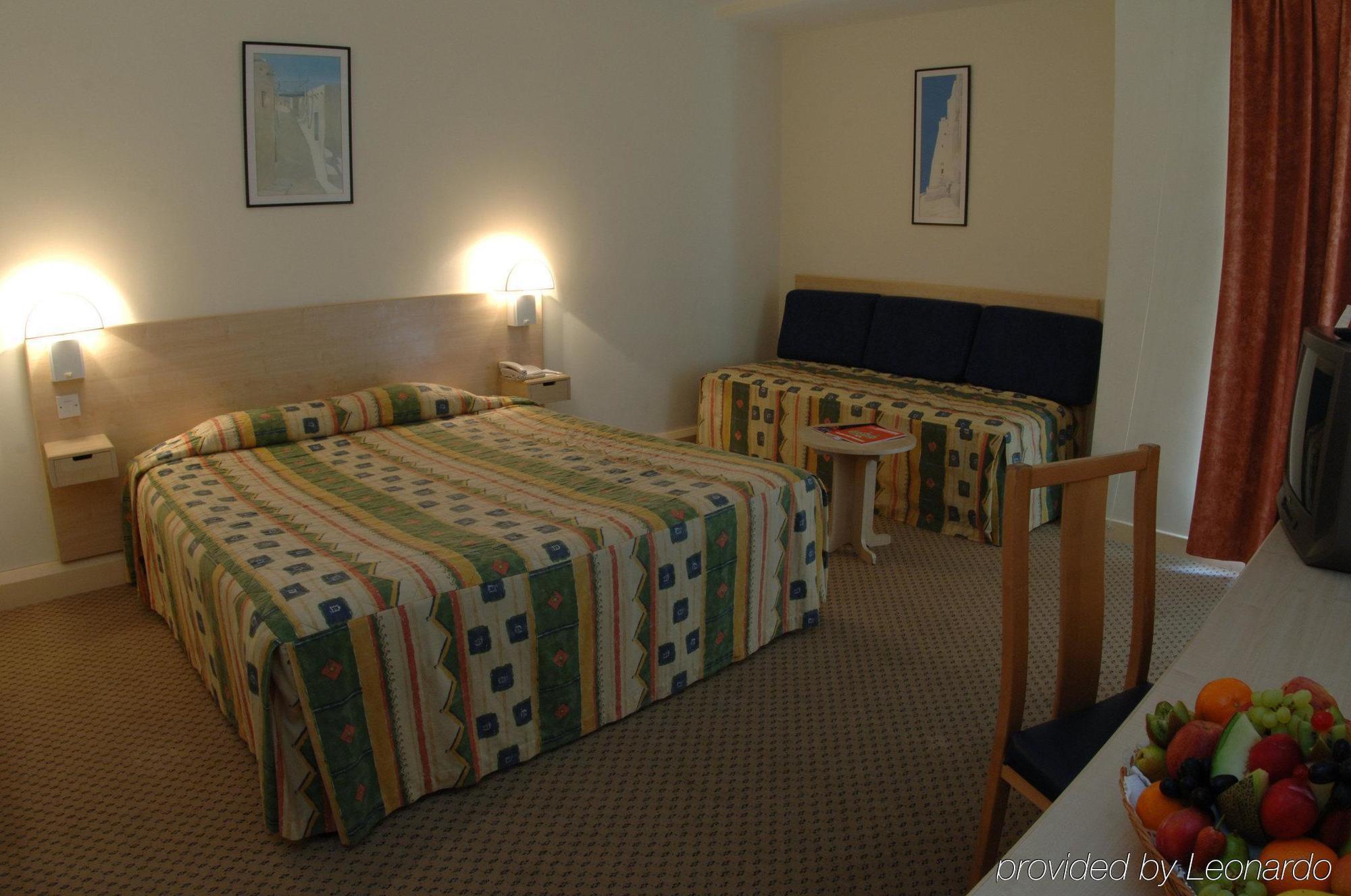 Tulip Inn Downtown מוסקט מראה חיצוני תמונה