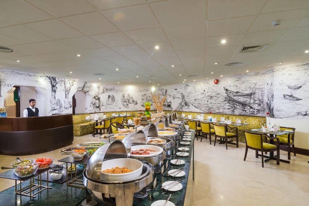 Tulip Inn Downtown מוסקט מראה חיצוני תמונה